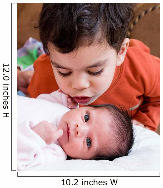 Young Boy Talking to His Newborn Sister Wall Mural