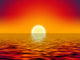 yellow sun over the ocean and red sky Wall Mural