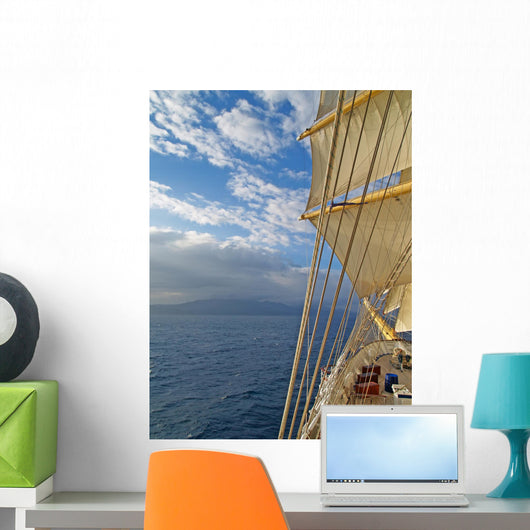 Tall ship under sails in the sea Wall Mural