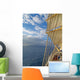 Tall ship under sails in the sea Wall Mural