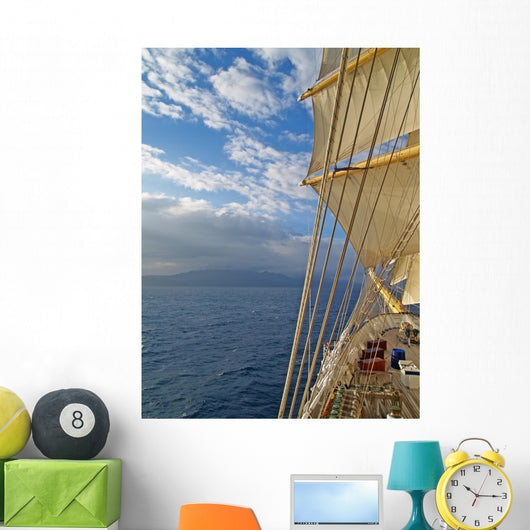 Tall ship under sails in the sea Wall Mural