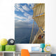 Tall ship under sails in the sea Wall Mural