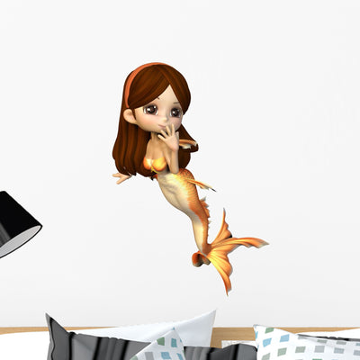 Cute Toon Goldfish Mermaid Wall Decal shown on a wall