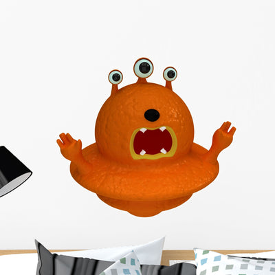 Orange Alien with Three Wall Decal shown on a wall