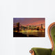 Brooklyn Bridge with city skyline at night Wall Mural