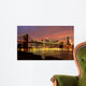 Brooklyn Bridge with city skyline at night Wall Mural