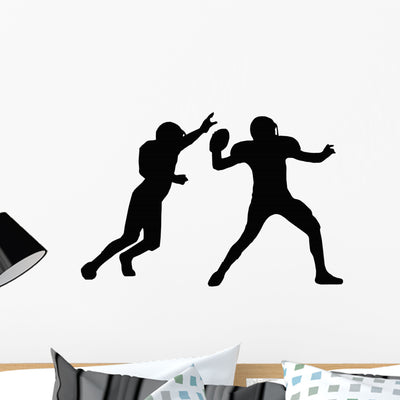 American Football Quarterback Silhouette Wall Decal shown on a wall