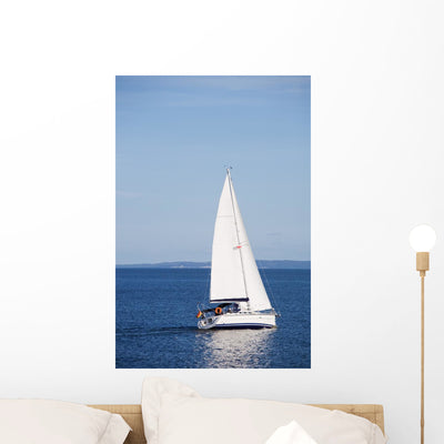 White Sailboat Wall Decal shown on a wall