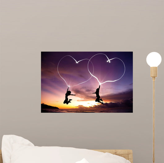 Young Couple Jumping Wall Decal