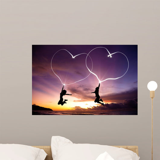 Young Couple Jumping Wall Decal