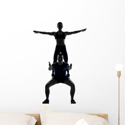 Couple Woman Man Exercising Wall Decal shown on a wall
