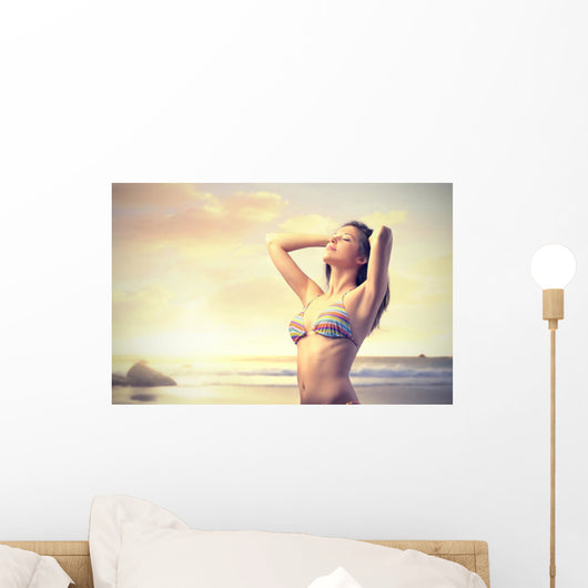 Woman on the Beach at Sunset Wall Decal