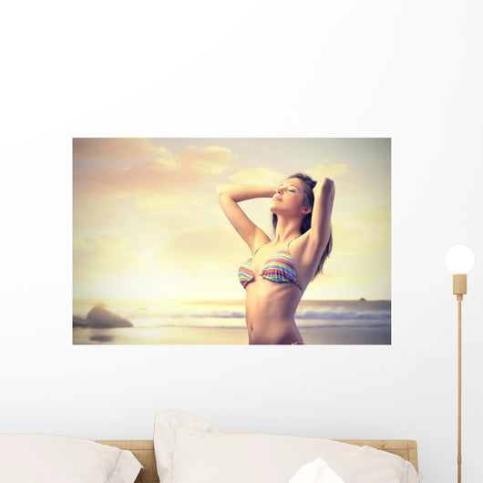 Woman on the Beach at Sunset Wall Decal