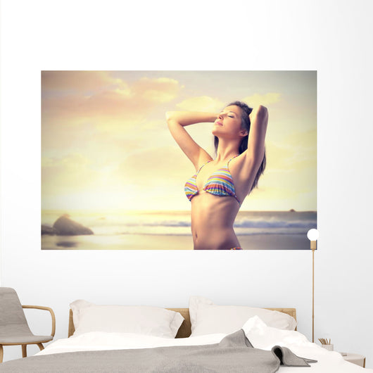 Woman on the Beach at Sunset Wall Decal