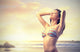 Woman on the Beach at Sunset Wall Decal