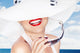 Woman in a Big White Summer Hat Wall Decal