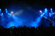 Cheering crowd at concert, musicians on the stage Wall Mural
