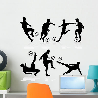 Silhouettes Football Players shown on a wall