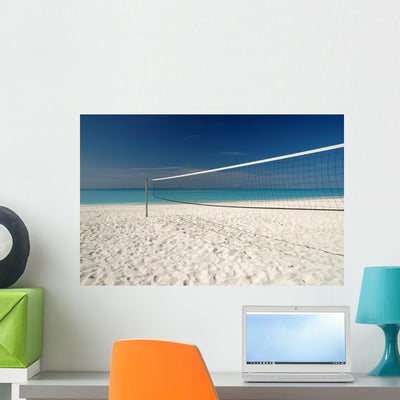 Beach Volleyball Wall Mural shown on a wall