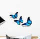 Three Blue Butterflies Flying Isolated on White Wall Decal