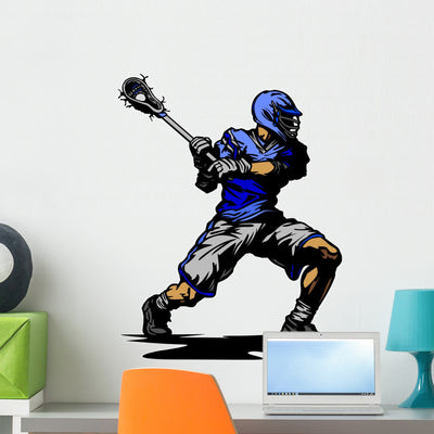 Lacrosse Player Cradling Ball Wall Decal shown on a wall
