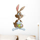 Easter bunny rabbit holding Easter eggs basket Wall Decal