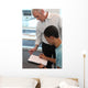 Teacher Supervising His Students