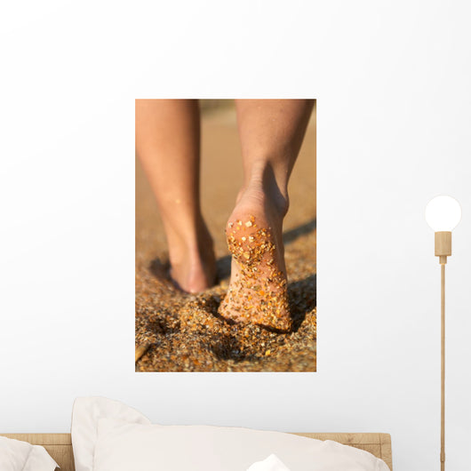 girl's barefoot legs Wall Mural
