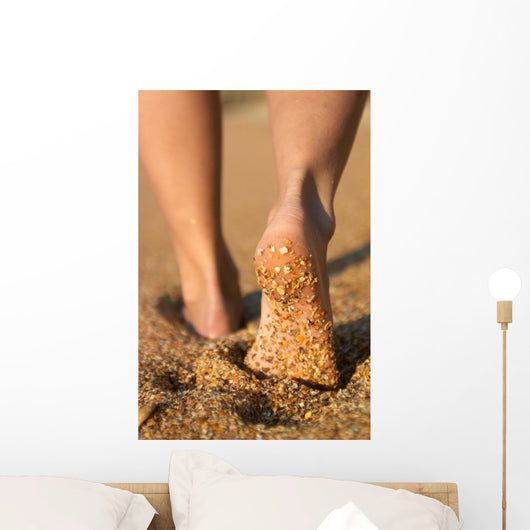 girl's barefoot legs Wall Mural
