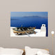 Old boat with oars on the bright white roof Wall Mural