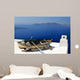 Old boat with oars on the bright white roof Wall Mural