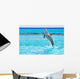 Dolphin jumping in the Caribbean Sea of Mexico Wall Mural