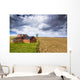 Farm with stormy sky Wall Mural