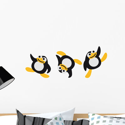 Dancingpenguins shown on a wall