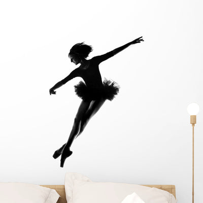 Female Ballerina Studio Landing Jump Wall Decal shown on a wall