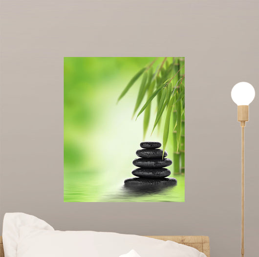 Tranquil zen design with stacked massage stones and bamboo Wall Mural