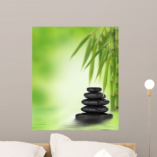 Tranquil zen design with stacked massage stones and bamboo Wall Mural