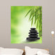 Tranquil zen design with stacked massage stones and bamboo Wall Mural
