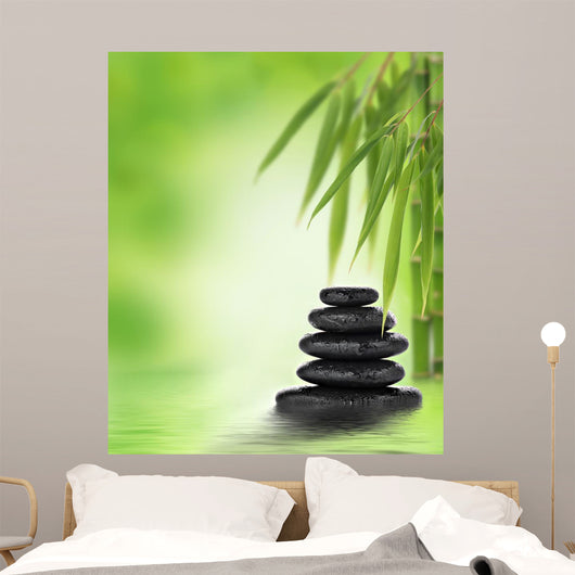 Tranquil zen design with stacked massage stones and bamboo Wall Mural