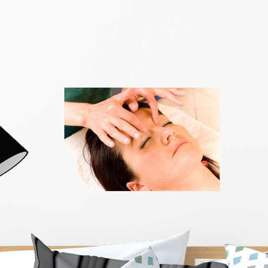 Woman Receives Facial Massage Wall Mural