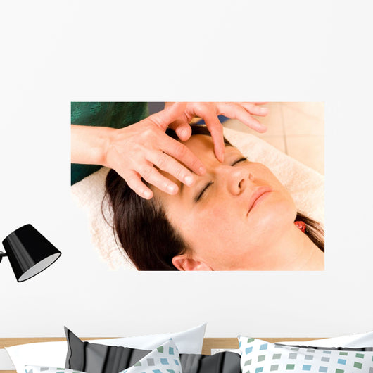 Woman Receives Facial Massage Wall Mural