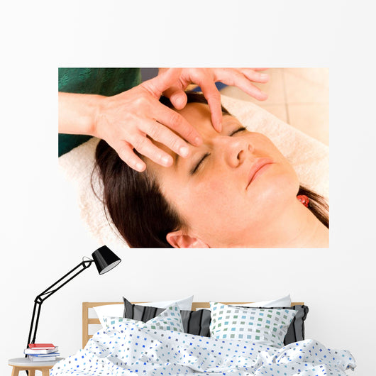 Woman Receives Facial Massage Wall Mural
