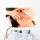 Woman Receives Facial Massage Wall Mural