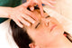 Woman Receives Facial Massage Wall Mural