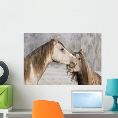 White Horses shown on a wall