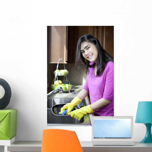 Teen Girl Washing Dishes
