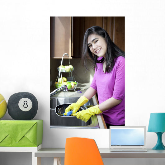 Teen Girl Washing Dishes