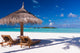 Chairs and Umbrella on a Beach Wall Mural