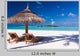 Chairs and Umbrella on a Beach Wall Mural