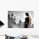 Long black haired woman in a misty cemetery Wall Mural